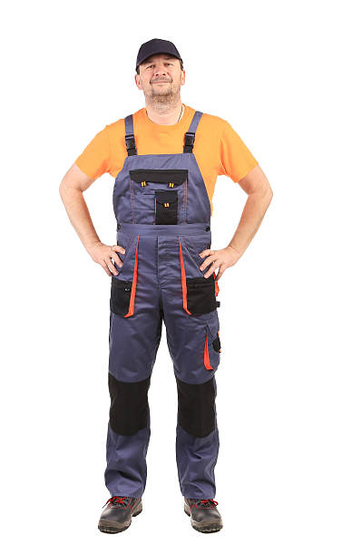 istock Happy worker wearing overalls. 460551353