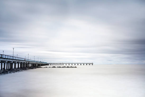 istock Sea, pier and rocks 460551375