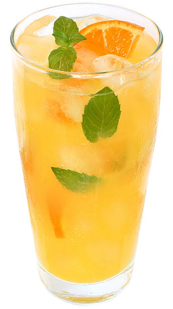 istock Cocktail with orange juice and ice cubes decorated leaf mint 460552501