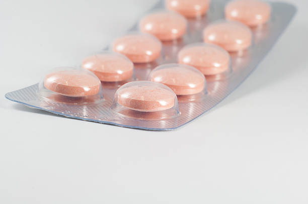 istock Closed up orange tablet in blister pack 460561669