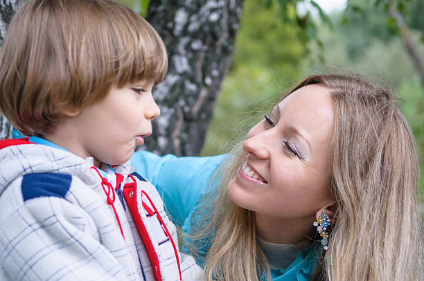 istock Mother and son in the forest 460562363