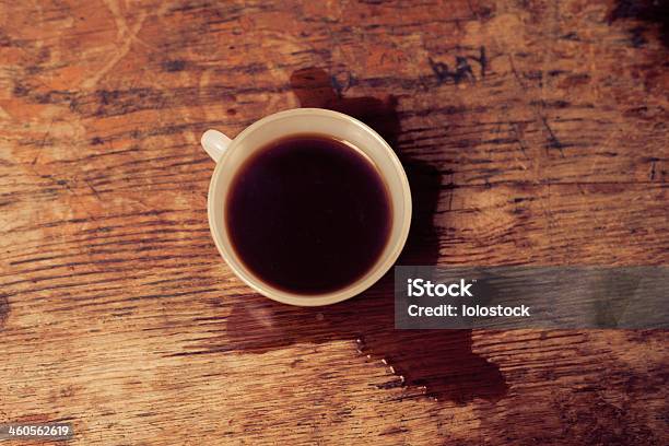 Top View Of Cup With Spilled Coffee Around It Stock Photo - Download Image Now - American Culture, Black Color, Bright