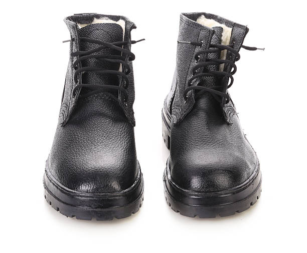istock Pair of black leather boots. 460570159