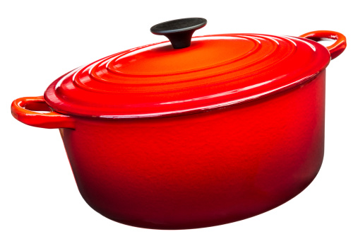 Red cast iron cooking pan, isolated on white. AdobeRGB colorspace.
