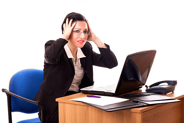 istock Businesswoman With Headache 460572217