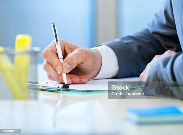 Businessman Writing Stock Photo - Download Image Now - Adult, Adults Only, Business
