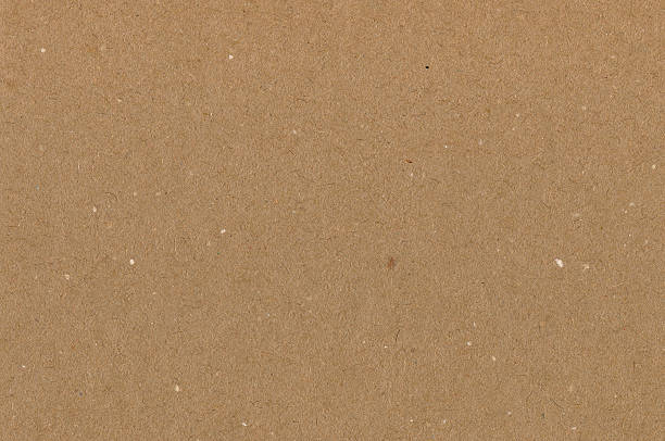 istock Wrapping paper brown cardboard texture, natural rough textured copy space 460618465