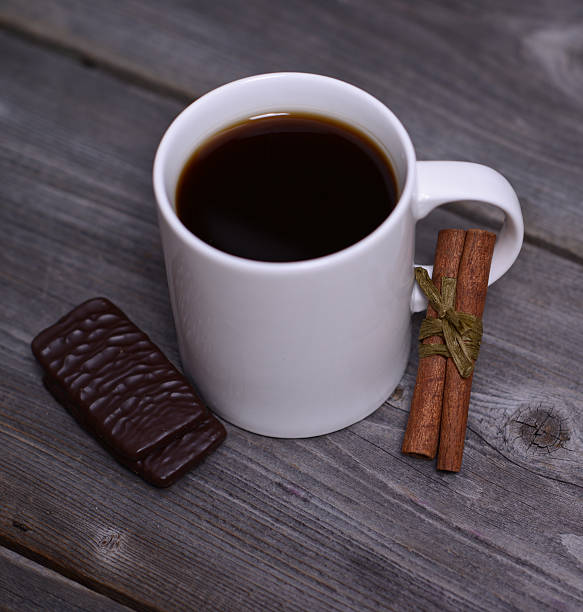 istock Mug of coffeek with cinnamon and chocolate 460639659