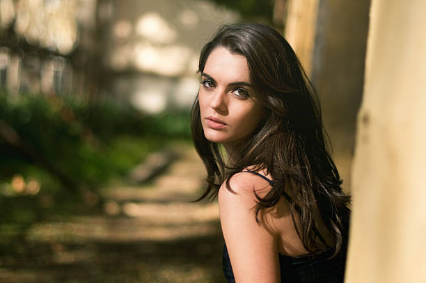 istock Young girl in a park 460640493
