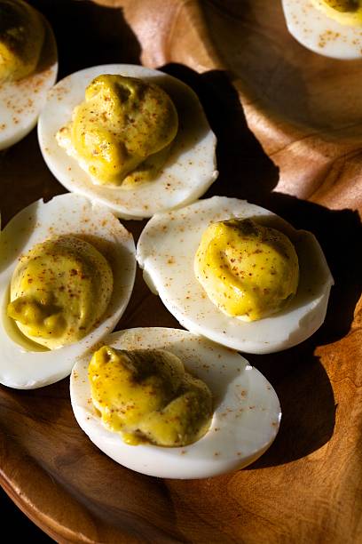 uova mimosa - hard cooked egg foto e immagini stock