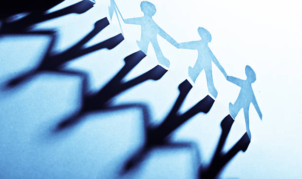 istock Paper people in teamworking concept 460641419