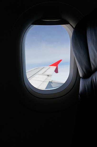 istock View from an airplane window on above sky 460642151
