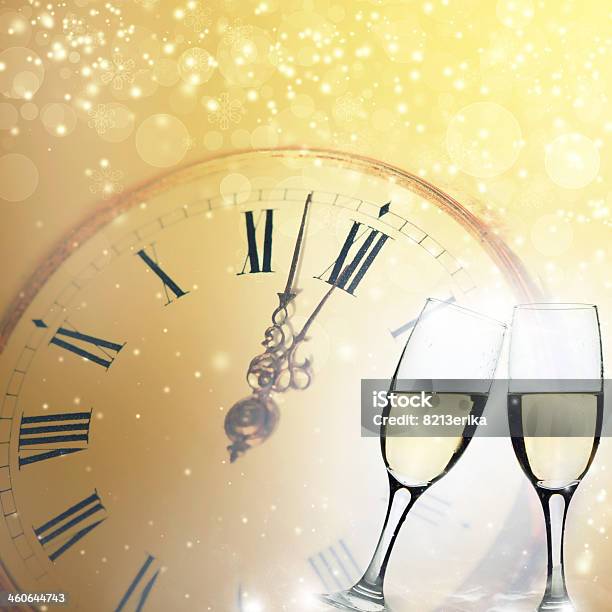 Glasses With Champagne And Clock Close To Midnight Stock Photo - Download Image Now - 12 O'Clock, 2014, Alcohol - Drink