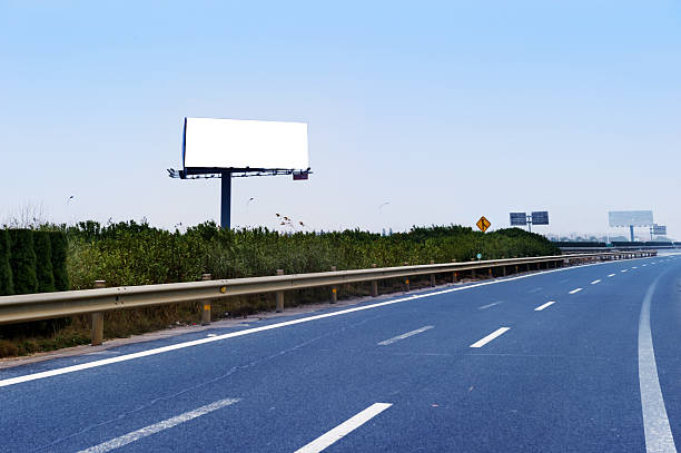 istock Commercial blank billboard besides the high-way 460652105