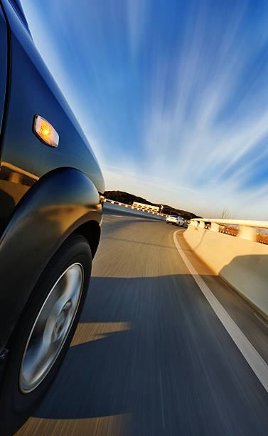 istock car on the road with motion blur background. 460666611