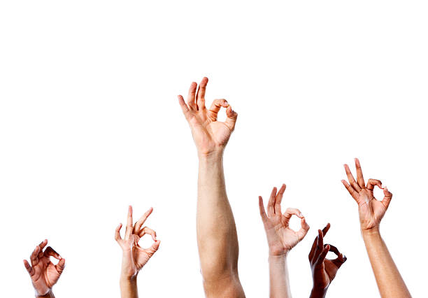 istock We approve! Six mixed hands make OK hand sign 460674577