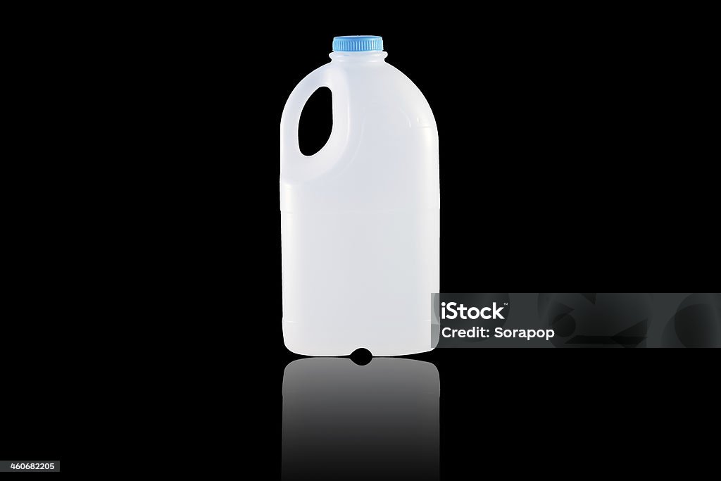 Gallon Milk A Gallon Milk isolate on the black background Milk Bottle Stock Photo