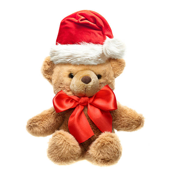 istock Classic teddy bear with red bow and Santa hat. 460682789
