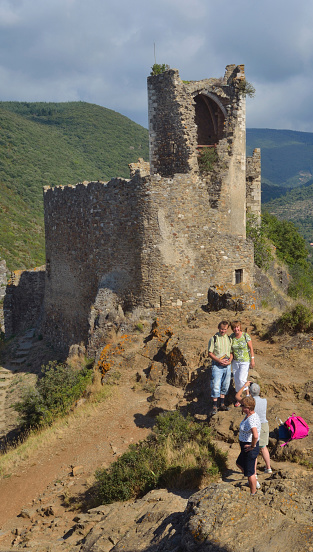 Lastours, Aude, France: September, 11, 2013: Tourists taking photos of each other at the 4 Castles Lastours