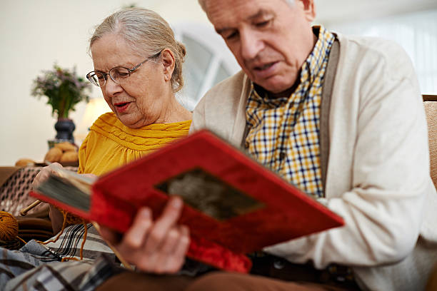 istock Seniors with album 460684815