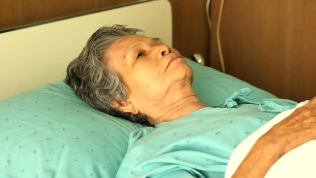 Elderly 80 plus year old female sleeping in hospital