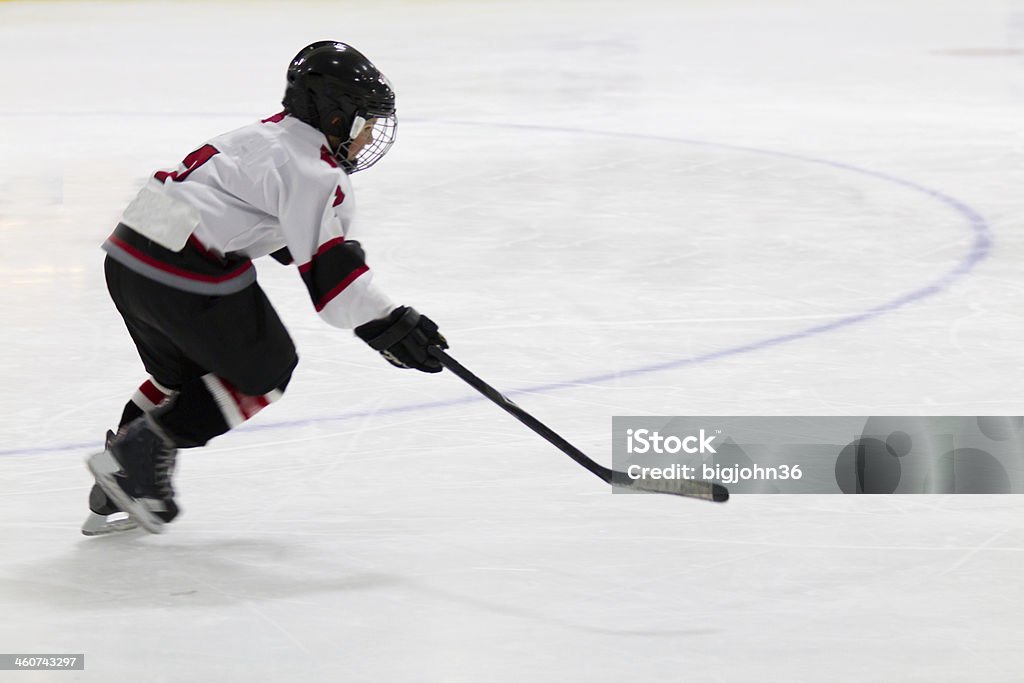 Child playing minor hockey Ice Hockey Stock Photo