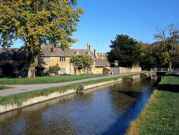 istock Village centre, Lower Slaughter, England. 460748419