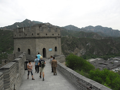 Beijing, China – May 24, 2012: A view of the Great Wall in Beijing, China. The Visitors are both locals and foreigners. They walk on the wall route.