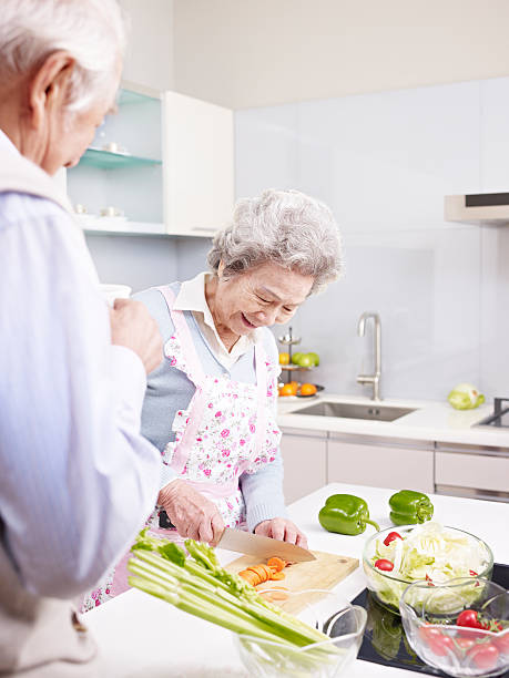 istock Senior couple cooking in the kitchen 460765009