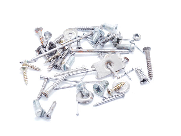 istock Nails, screws and nuts on a white background 460765117