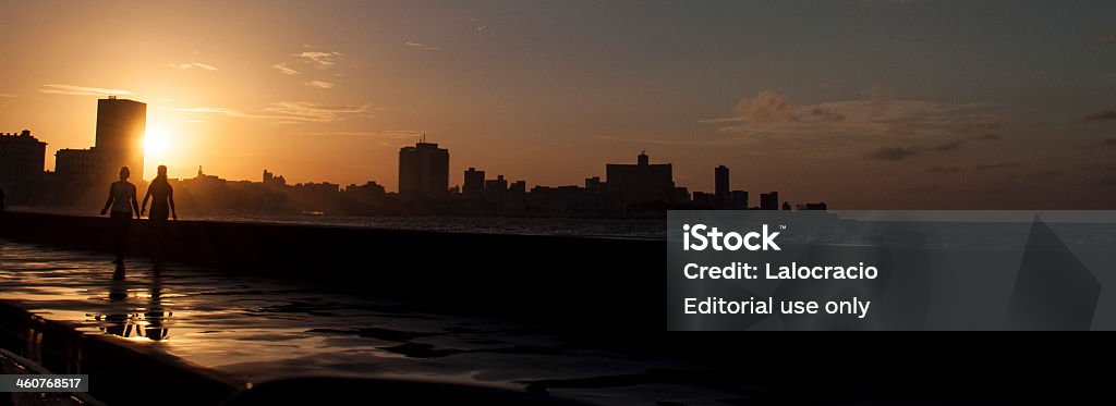 Puesta de sol sobre la costanera Malecón - Foto de stock de Aire libre libre de derechos