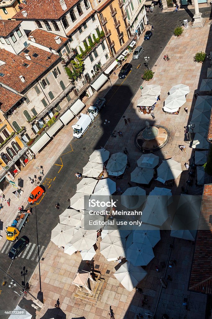 shadow of Torre dei Lamberti at Piazza  Miracoli Verona, Italy - August 5, 2009:shadow of the Torre dei Lamberti at the  Piazza dei Miracoli  in Verona, Italy. With 84 meters, the torre is the tallest building in town. Ancient Stock Photo