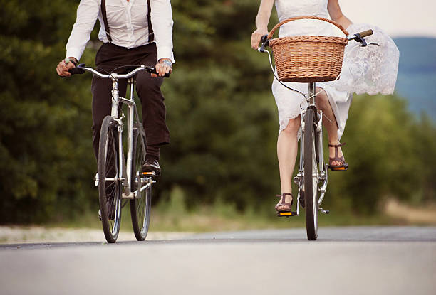 istock Bride and groom on the bikes 460780379