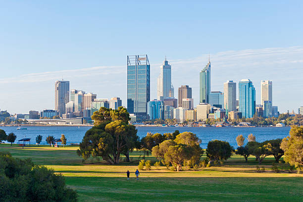 Skyline of Perth Perth, Australia - February 17, 2013: The skyline of the city of Perth in Western Australia. Perth is the capital of Western Australia and consists of approximately 1,9 million inhabitants. The scenery is seen from Sir James Mitchell Park with Swan river in front. perth australia photos stock pictures, royalty-free photos & images