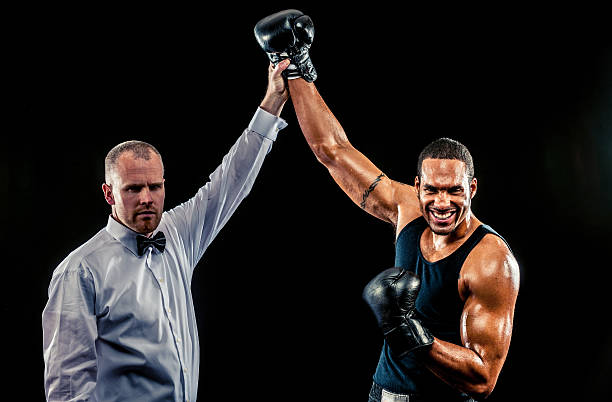 istock African American Male Boxer with judge 460784247