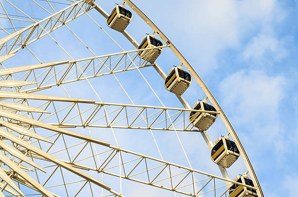 istock cabins Ferris wheel on a background of sky 460786029