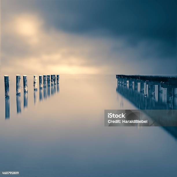 Jetty On A Lake With Dramatic Sky Stock Photo - Download Image Now - Atmospheric Mood, Autumn, Bavaria