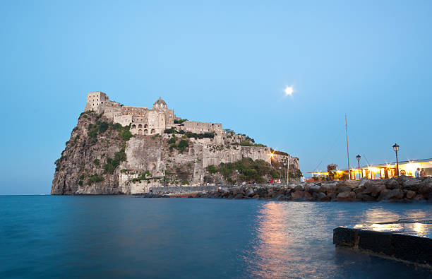 istock Aragonese Castle in Ischia island by night 460796053