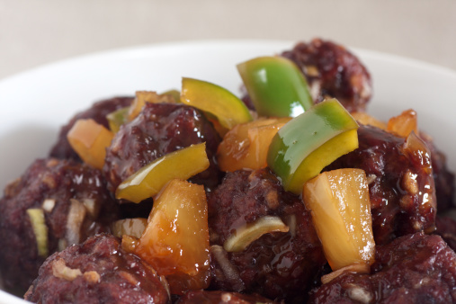 sweet and sour meatballs with pineapple chunks