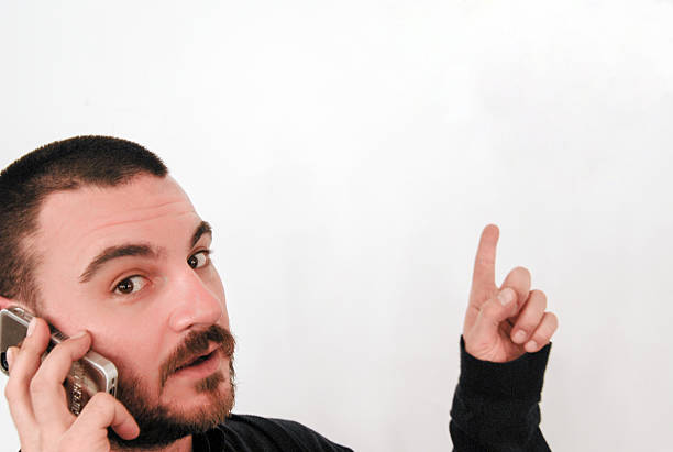 man talking to telephone pointing the white background
