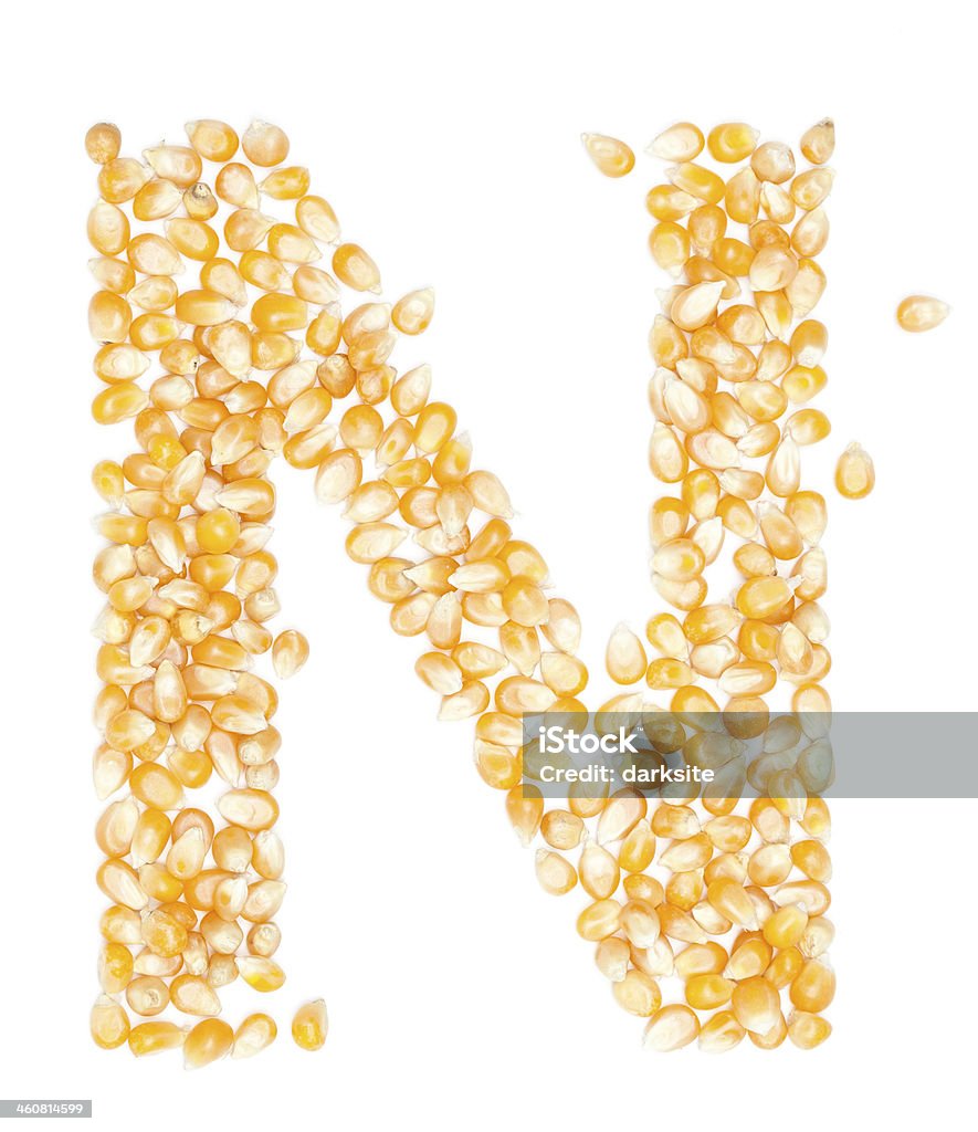 corn N,Alphabet from Organic corn beans dry on white Agriculture Stock Photo