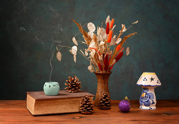 istock Old books and dried flowers 460841943
