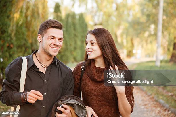 Young Couple Walking Outdoors Stock Photo - Download Image Now - 20-29 Years, Adult, Boyfriend