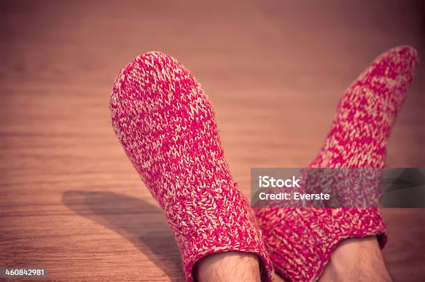 Man Legs In Red Wool Socks Male Knitted Clothes Winter Stock Photo - Download Image Now
