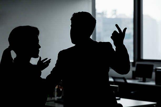 istock Two business people gesturing and arguing in the office 460844303