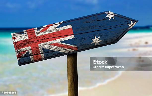 Australia Flag Wooden Sign With A Beach On Background Stock Photo - Download Image Now