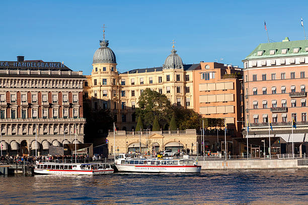 Grand Hotel in Stockholm - Sweden Stockholm, Sweden - October 12, 2013: Grand Hotel on October 12, 2013 in Stockholm. Grand Hotel is a luxury hotel at Stockholm waterfront and the only Swedish hotel among The Leading Hotels of The World. strommen stock pictures, royalty-free photos & images