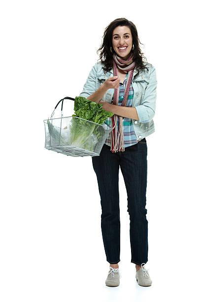 istock Cheerful woman holding basket 460858153