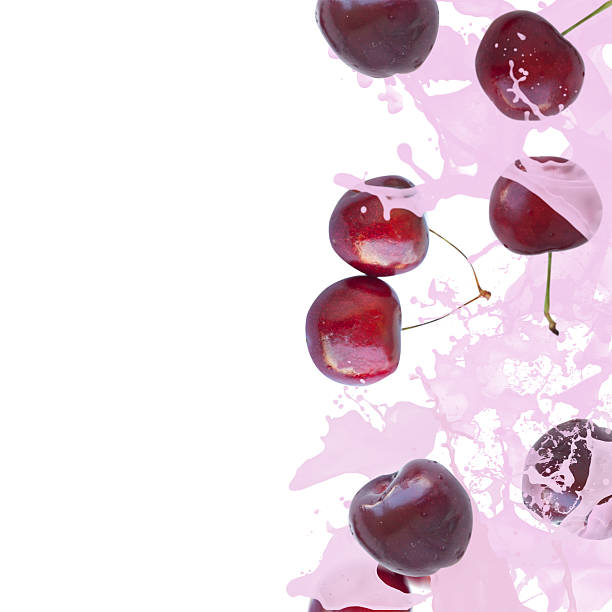 istock Berries falling into the yogurt splash 460878405