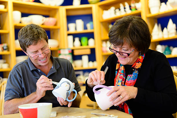 istock Senior Couple Painting Pottery 460895147